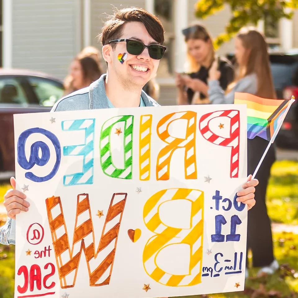 BW student holding a pride sign